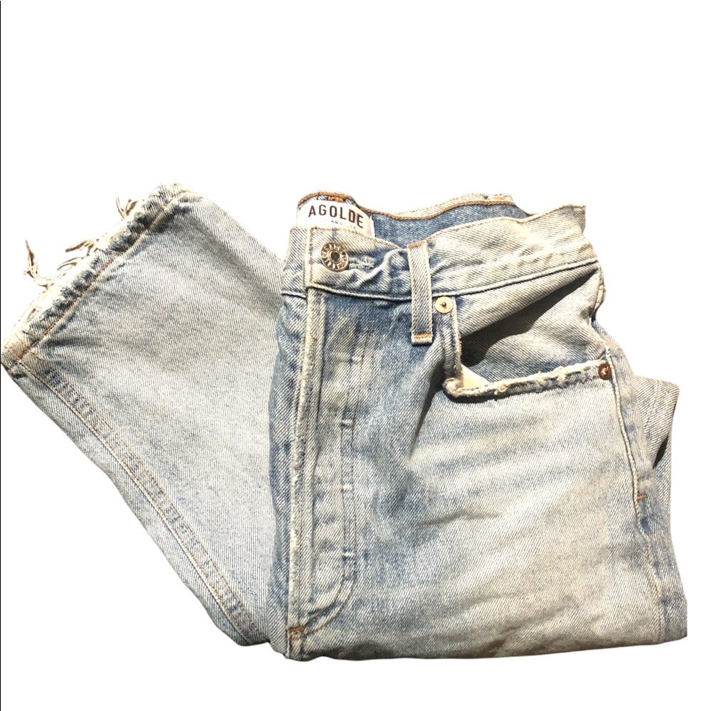 Agolde light blue jeans. High waisted button closure frayed hemlines on legs 27